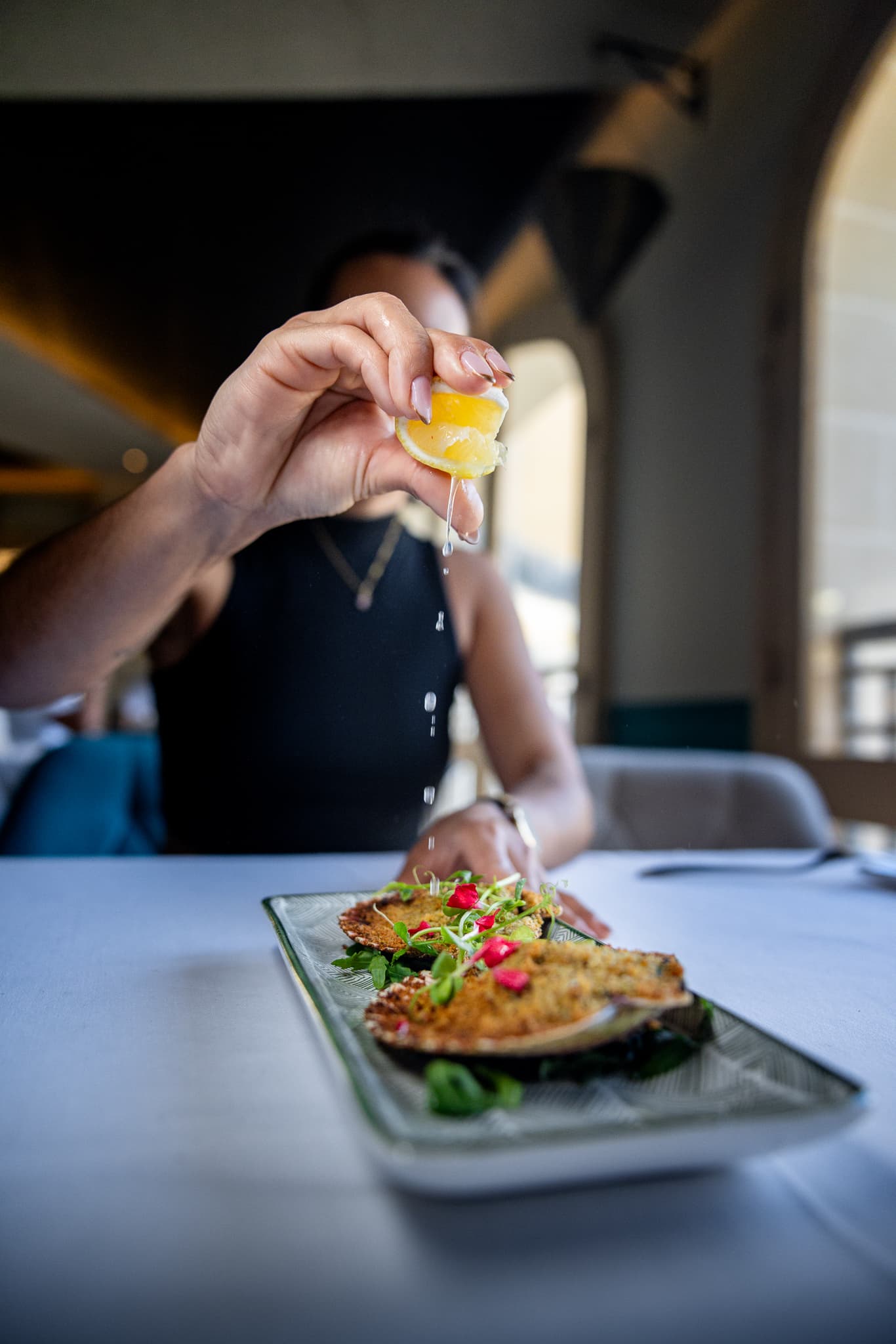 Squeezing fresh lemon